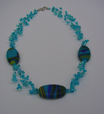 Perlenkette Rainbowstone.de